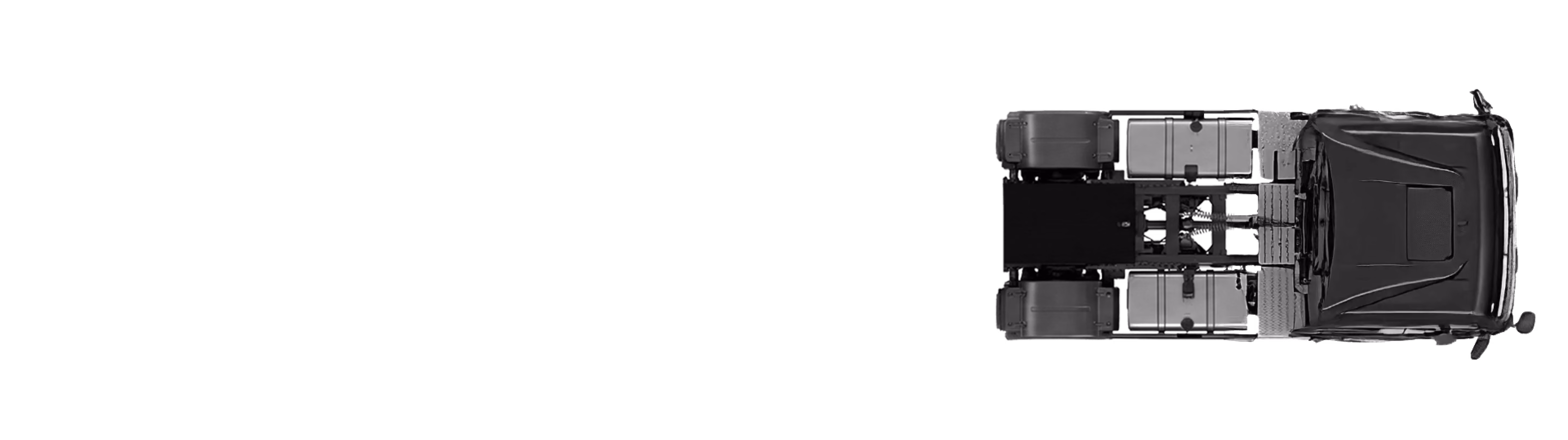 Top view of a black truck chassis without the cargo bed or trailer attached.